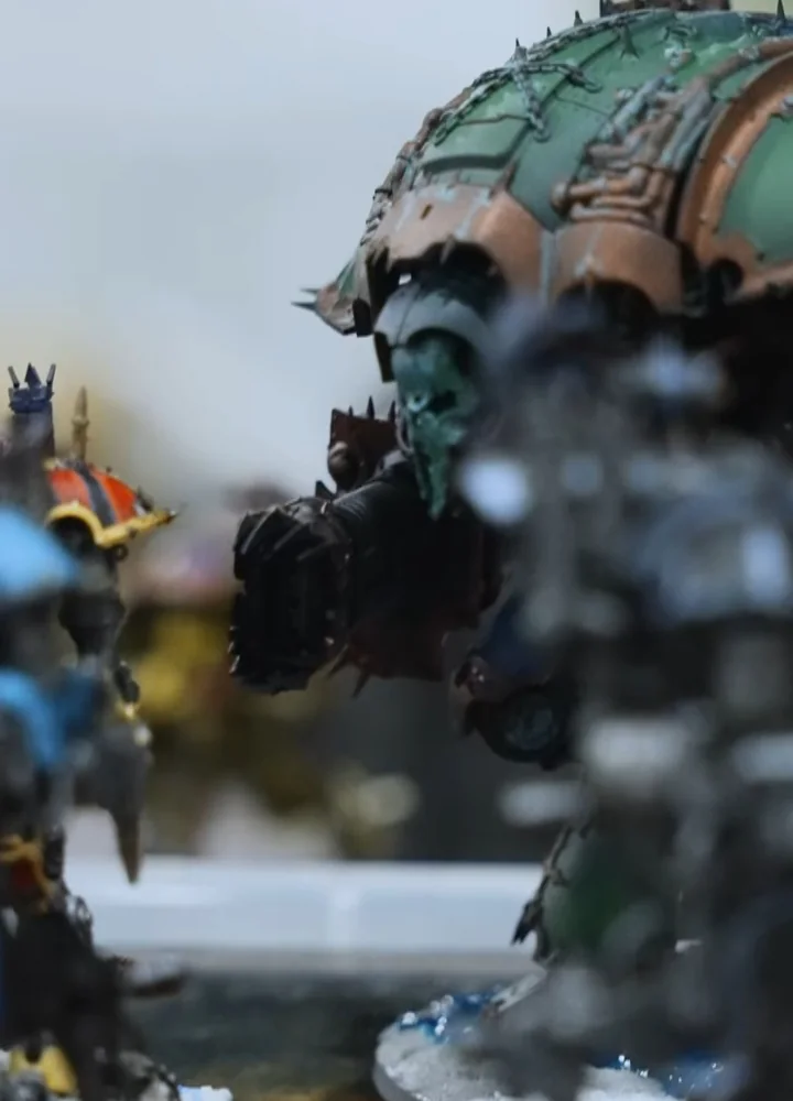 A painted miniature on a tabletop.me battlefield